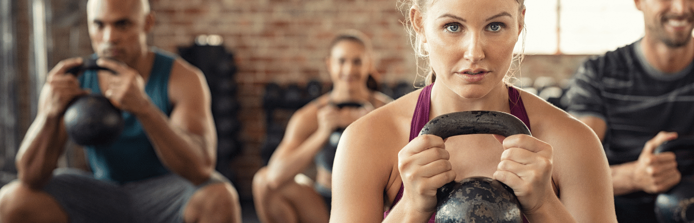 endurance athletes doing kettlebell training